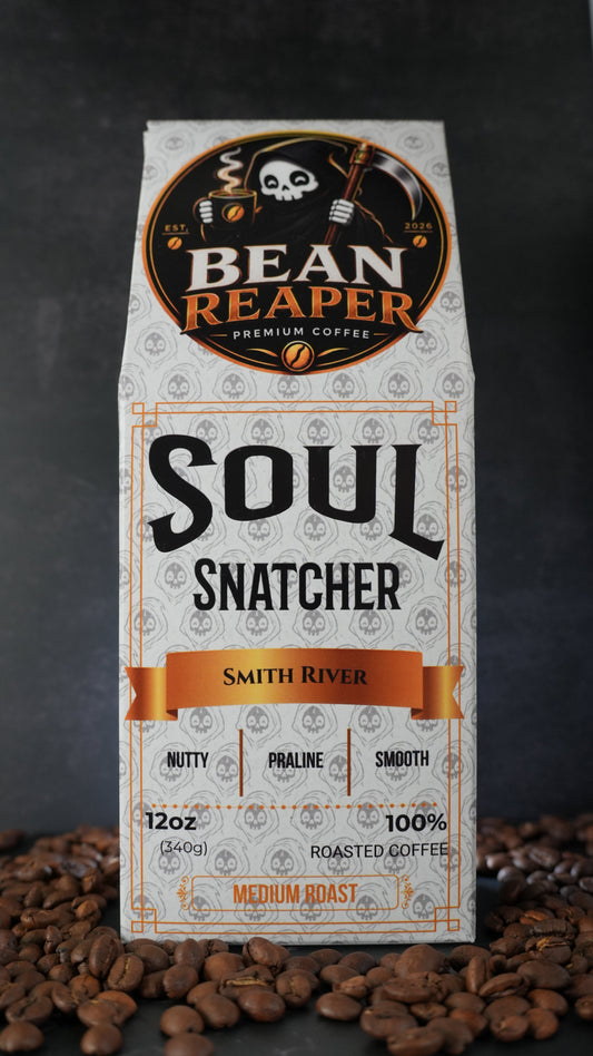 Bean Reaper Soul Snatcher coffee bag front — Smith River, 12 oz medium roast, standing on whole coffee beans