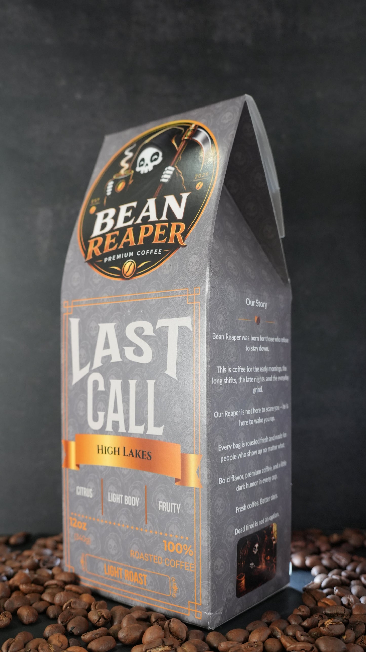 Bean Reaper Last Call coffee bag at a three-quarter angle — High Lakes, 12 oz light roast, standing on whole coffee beans
