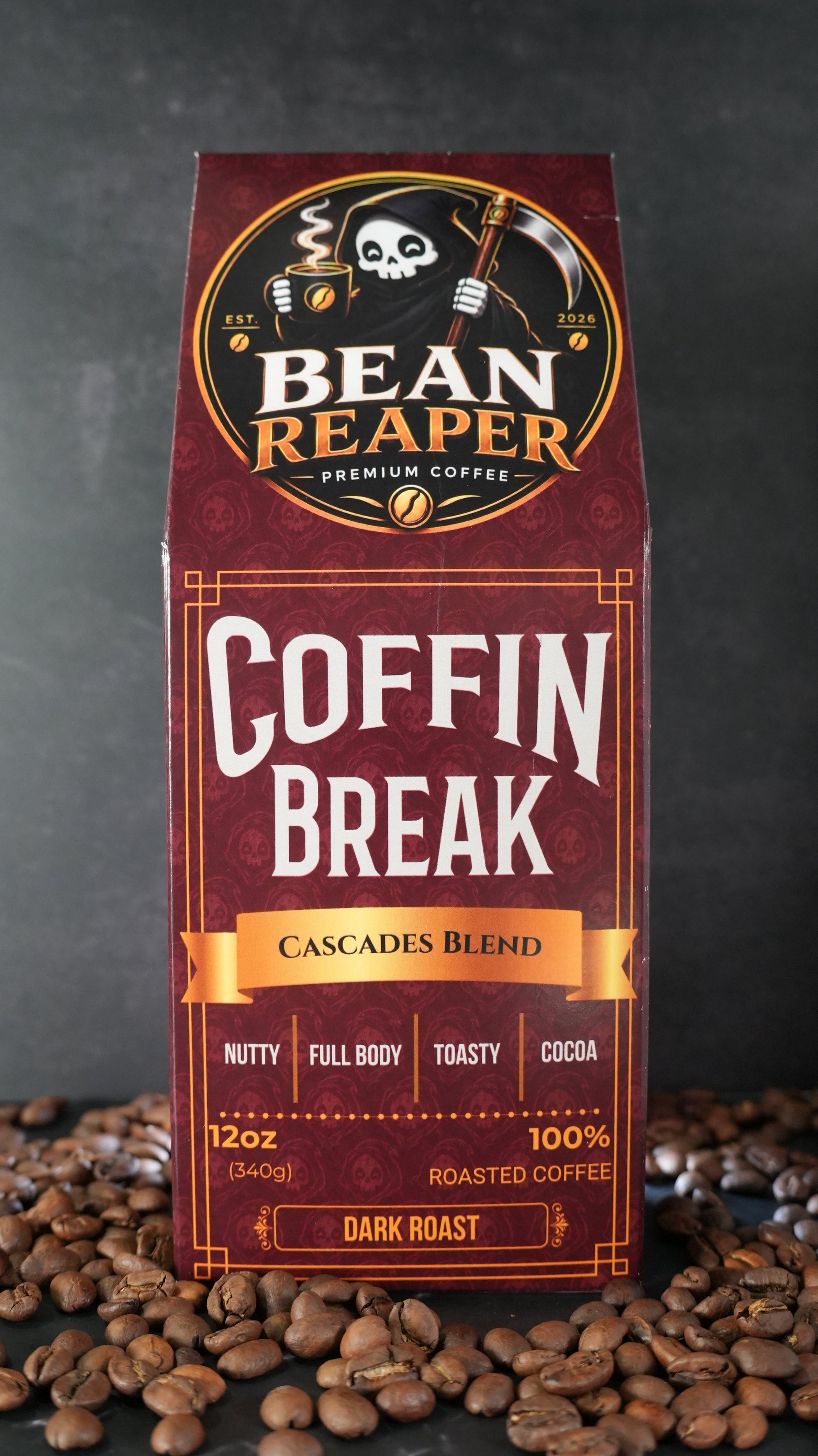 Bean Reaper Coffin Break coffee bag front — Cascades Blend, 12 oz, standing on whole coffee beans