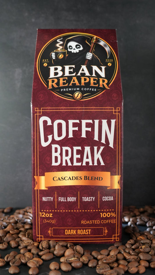 Bean Reaper Coffin Break coffee bag front — Cascades Blend, 12 oz, standing on whole coffee beans